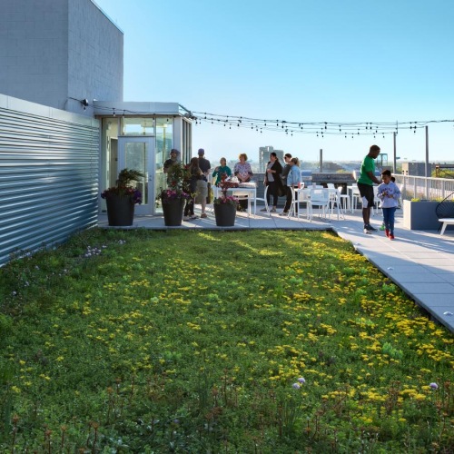 people walking on a sidewalk