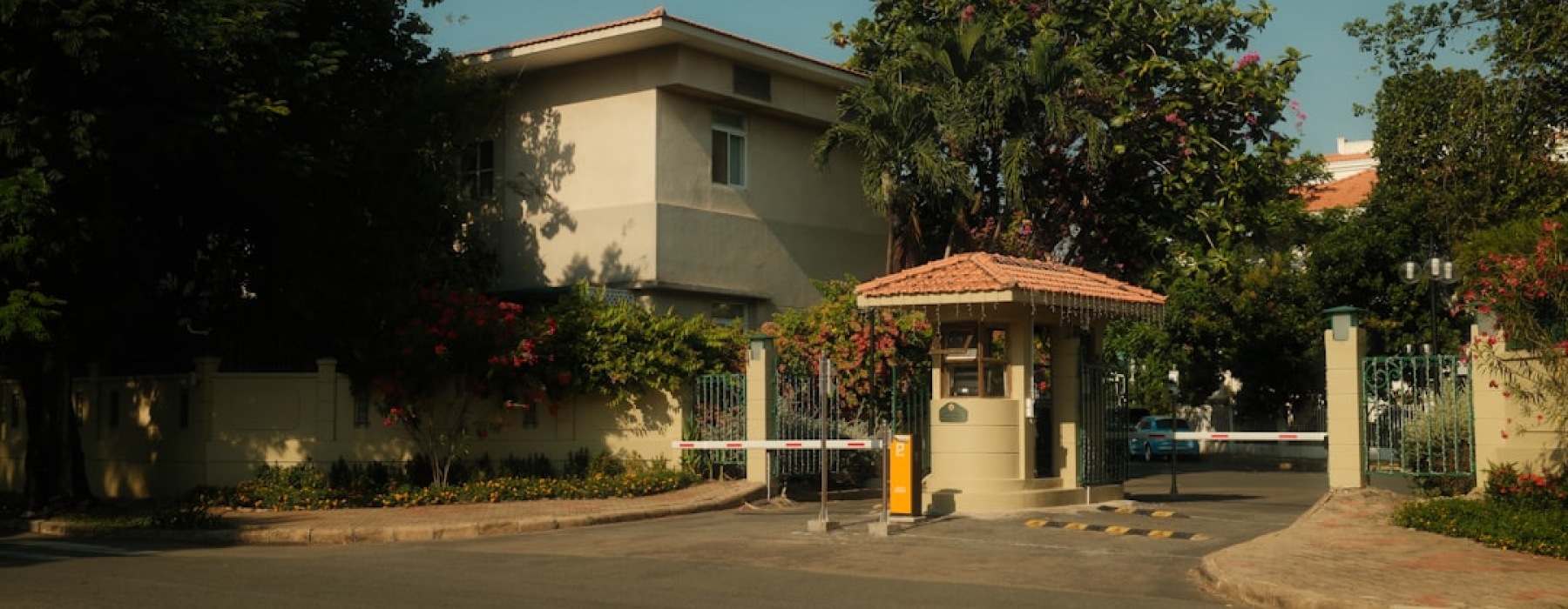 apartments gated community entrance with security gates