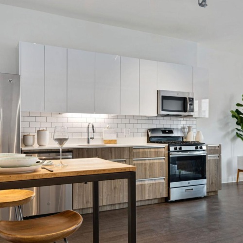 a kitchen with a table and chairs